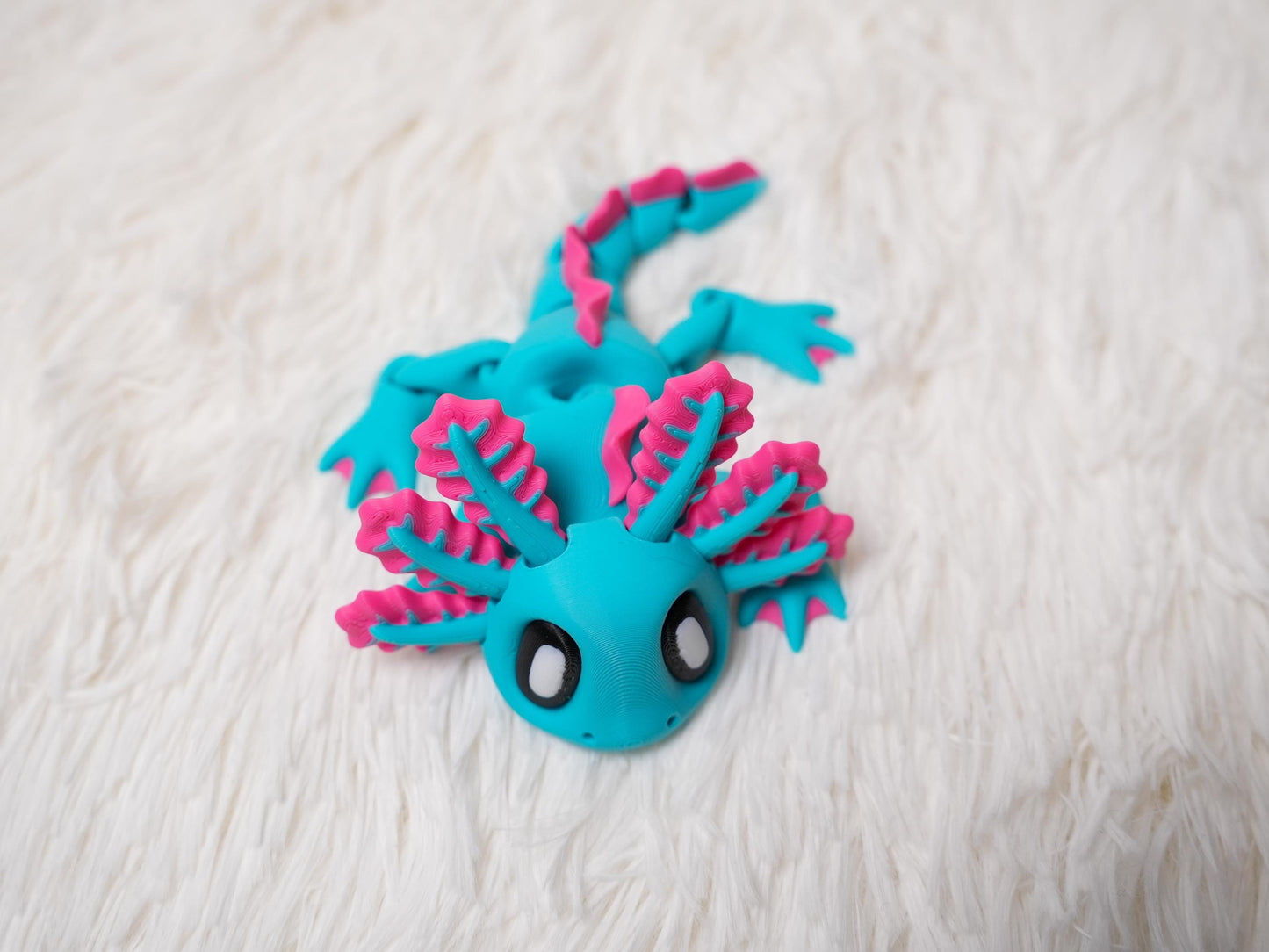 3D Printed Articulating Axolotl Fidget Toy with Glow-in-the-Dark Seaweed Bed