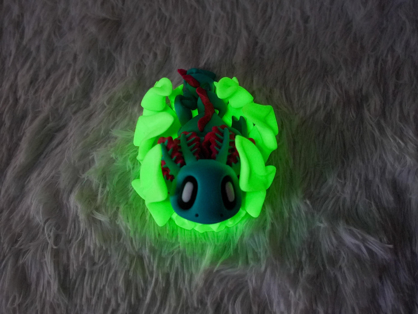 3D Printed Articulating Axolotl Fidget Toy with Glow-in-the-Dark Seaweed Bed