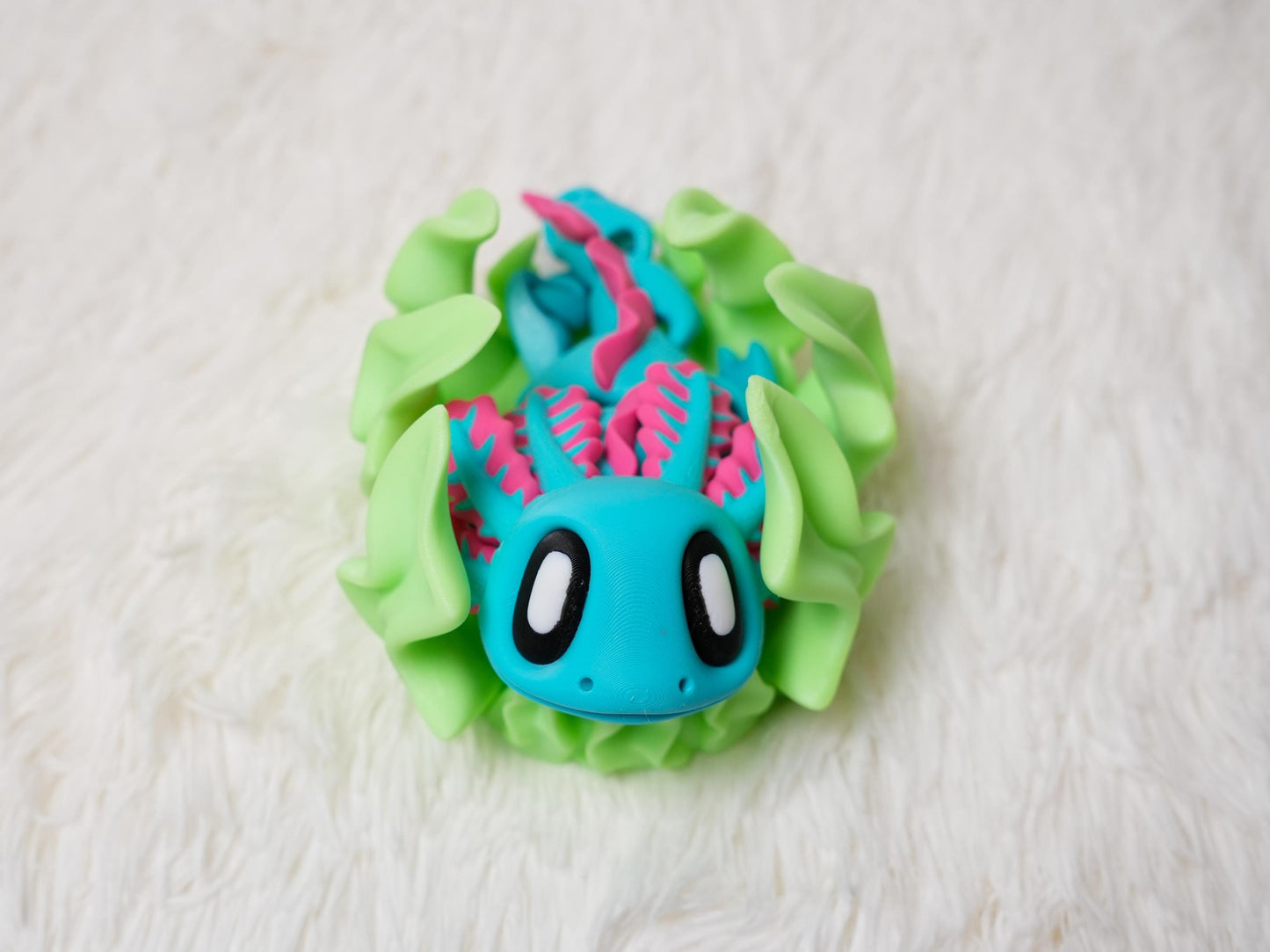 3D Printed Articulating Axolotl Fidget Toy with Glow-in-the-Dark Seaweed Bed